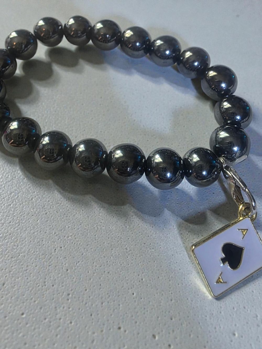 Hematite Beaded Bracelet with Ace of Spades Charm